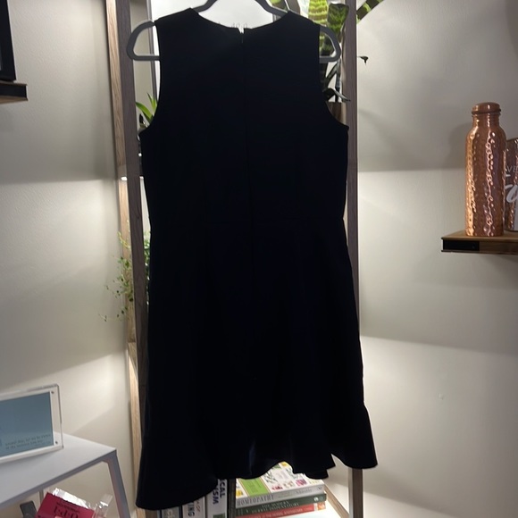 Flirty little black dress with pockets and pearls. - Picture 3 of 4